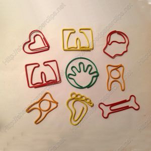 medical shaped paper clips in body part outlines