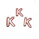 shaped paper clips in the outline of letter K