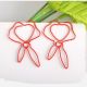 red scarf shaped paper clips