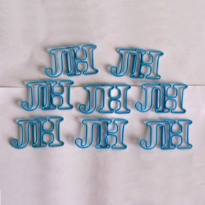 Initial shaped paper clips in JH outline