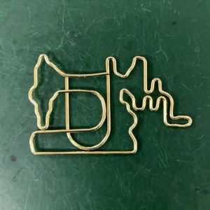 sewing machine shaped paper clips, gold decorative paper clips
