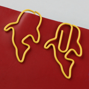 fish shaped paper clips in whale outline