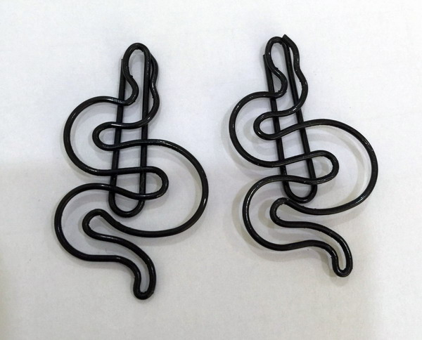 black paper clips in vinyl coat