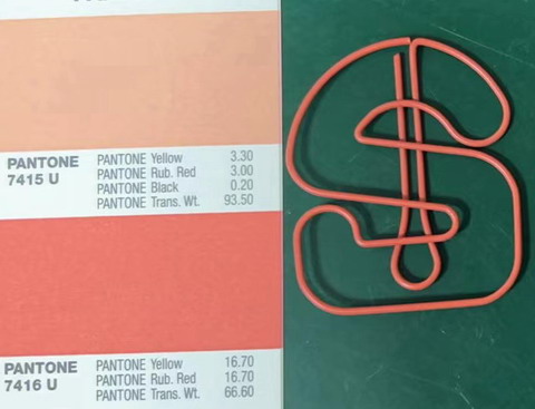 shaped paper clips in sprayed paint color